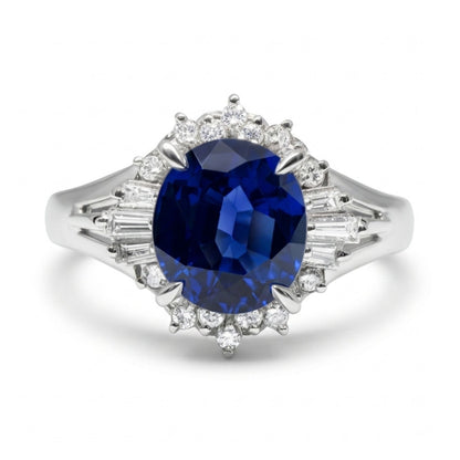 Platinum 1.68ct Oval Blue Sapphire 0.22cttw White Diamonds Ring