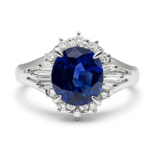 Platinum 1.68ct Oval Blue Sapphire 0.22cttw White Diamonds Ring