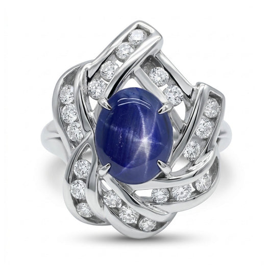 Platinum 2.44ct Oval Star Sapphire 0.43cttw White Diamonds Ring