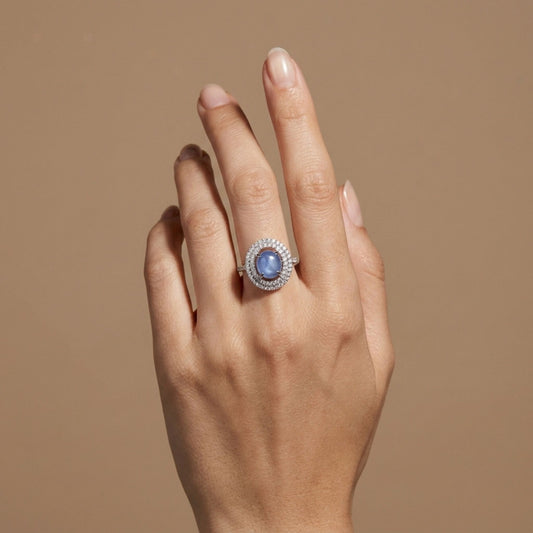 18K 2.16ct Oval Star Sapphire 0.67cttw White Diamonds Ring