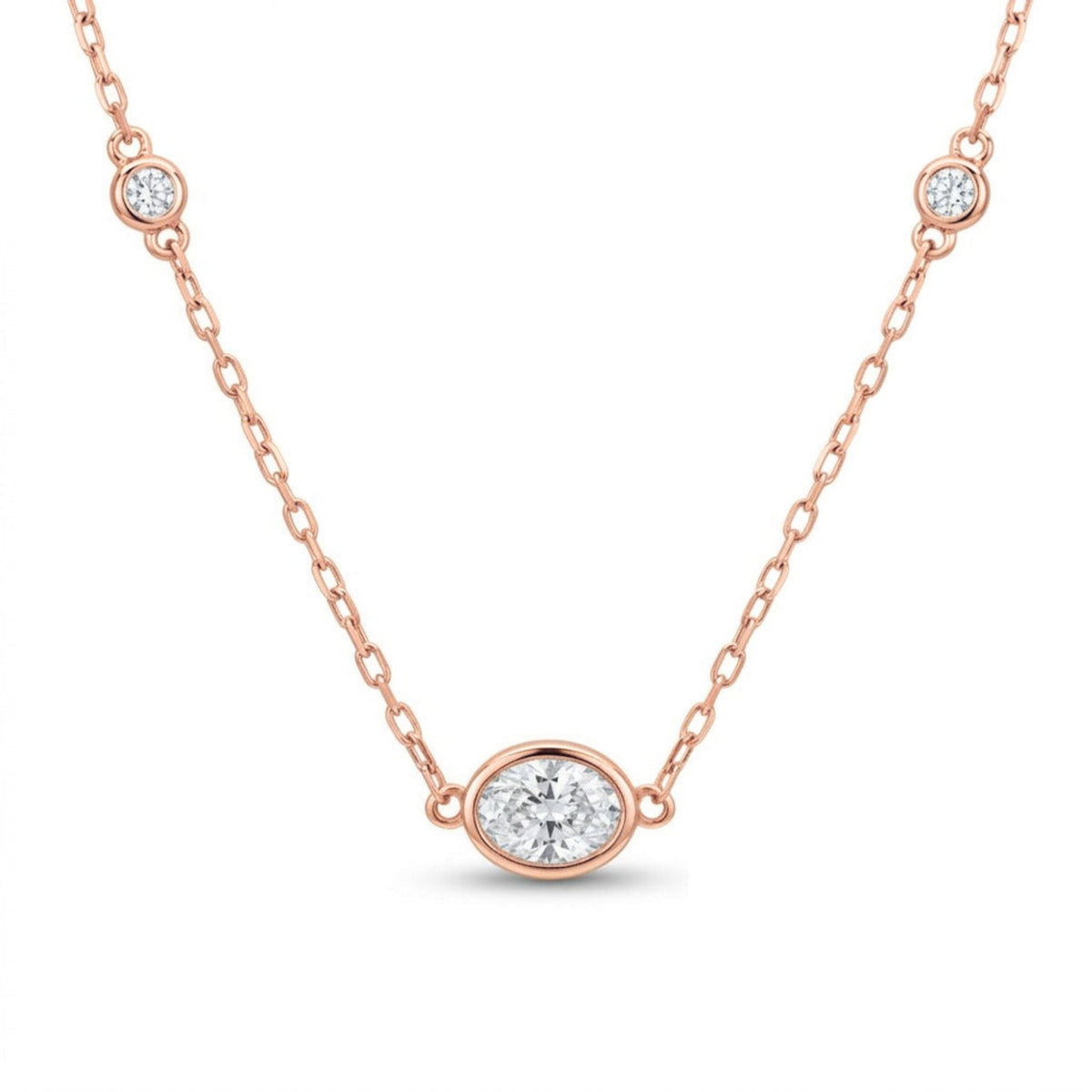 14K gold bezel set solitaire necklace with 0.40cttw oval VS white diamond