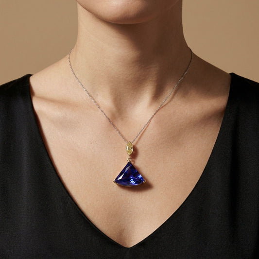 14K 12.85ct Fancy Cut Blue Wing Tanzanite 0.53ct Marquise VS Yellow Diamond Pendant