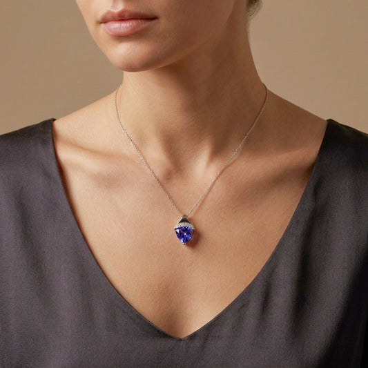 14K 1.80ct Trilliant Blue Wing Tanzanite 0.08cttw VS White Diamonds Pendant