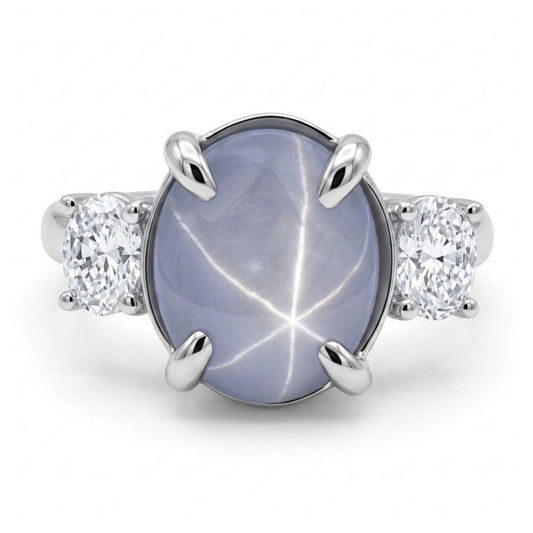 14K 6.61ct Oval Star Sapphire 0.55cttw White Diamonds Ring