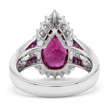 14K gold ring with 6.80ct pear shape copper bearing tourmaline and 1.29cttw VS white diamonds