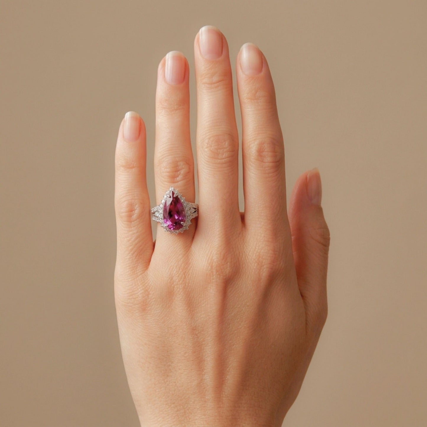 14K gold pear shape copper bearing tourmaline ring with VS white diamonds