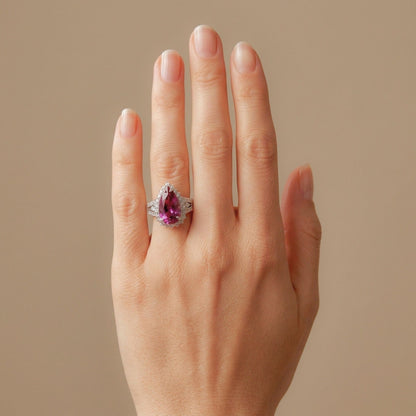 14K gold pear shape copper bearing tourmaline ring with VS white diamonds