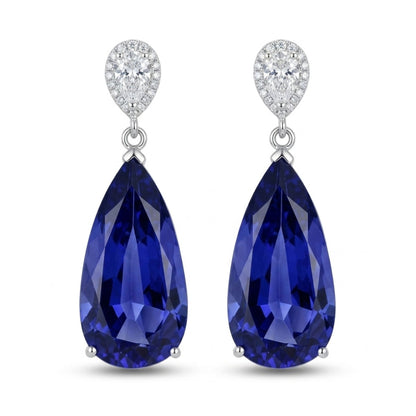 14K 24.15cttw Pear Shape Blue Wing Tanzanite 0.99cttw White Diamonds Earrings