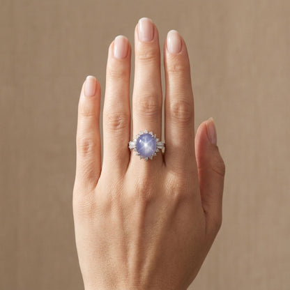 Platinum 11.83ct Oval Star Sapphire 0.71cttw White Diamonds Ring