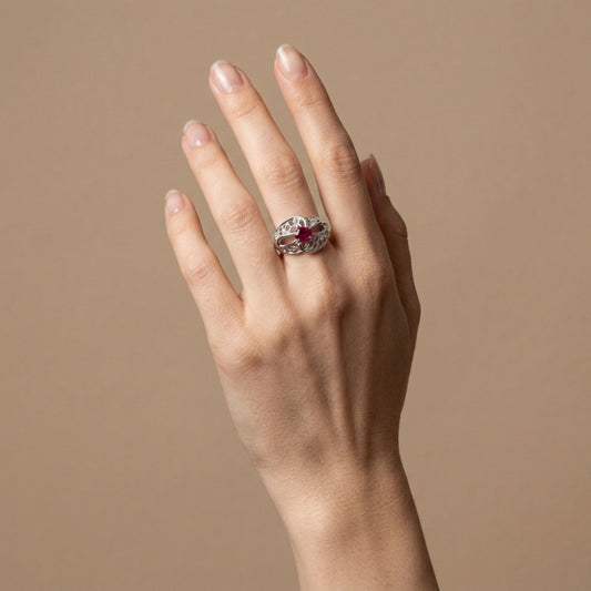 18K 0.71ct Oval Burma Ruby 0.10cttw White Diamonds Ring