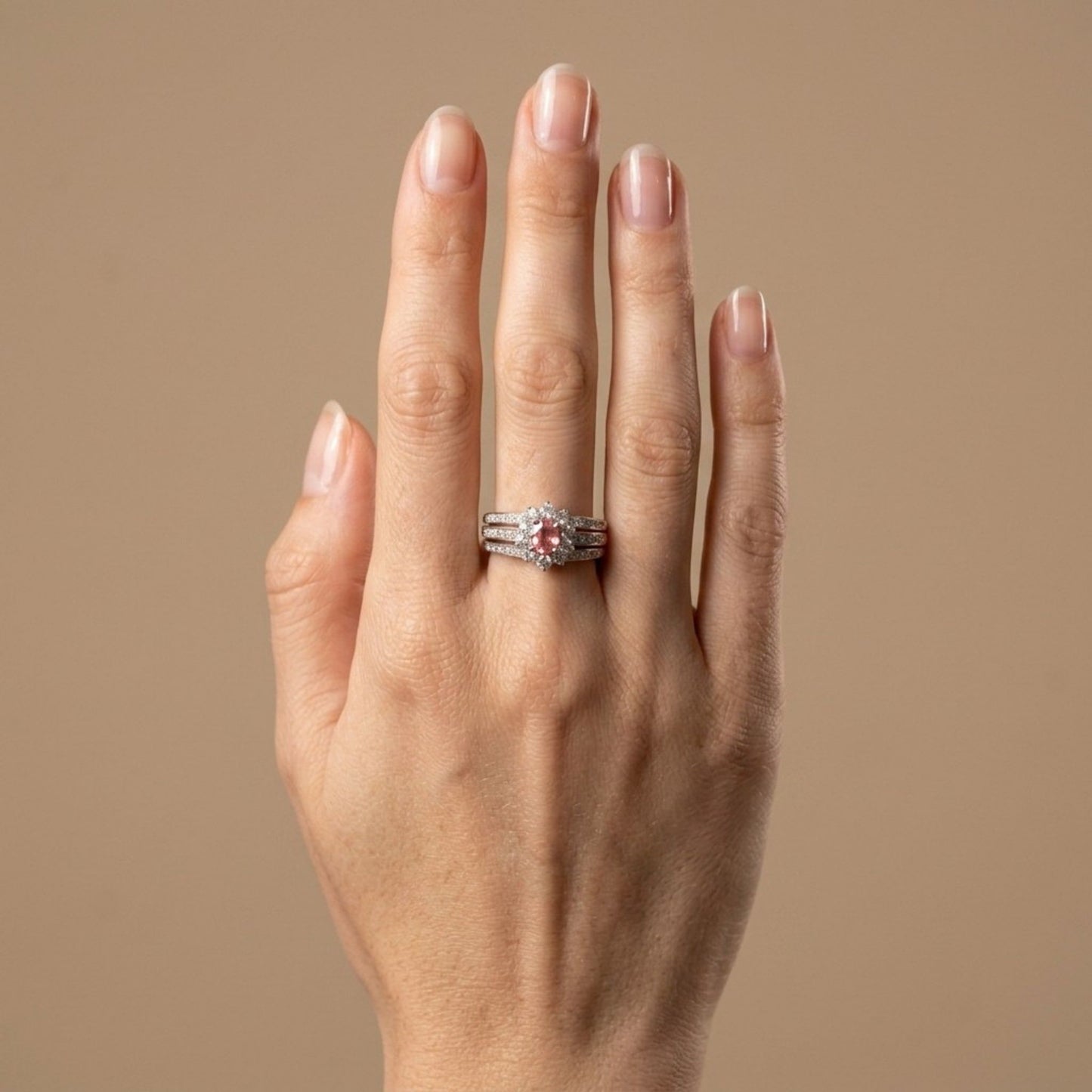 Platinum 0.52ct Oval Padparadscha 0.54cttw White Diamonds Ring