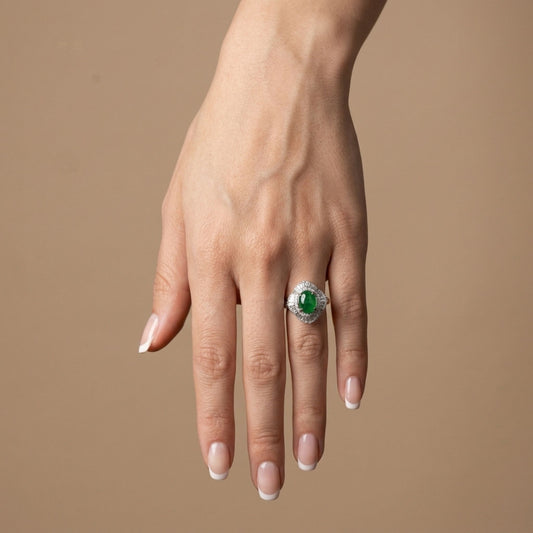 Platinum 9x7 Oval Jadeite 1.05cttw White Diamonds Ring