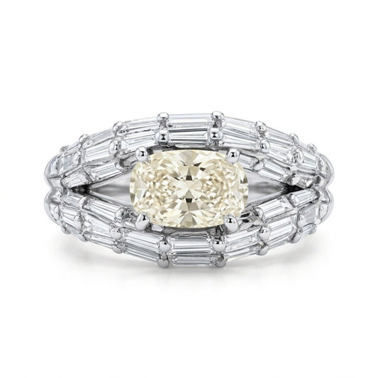 Platinum 1.01ct Oval Yellow Diamond 1.28cttw Baguette White Diamond Ring