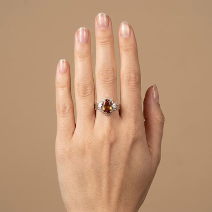 Platinum 1.76ct Oval Imperial Topaz 0.49cttw White Diamonds Ring