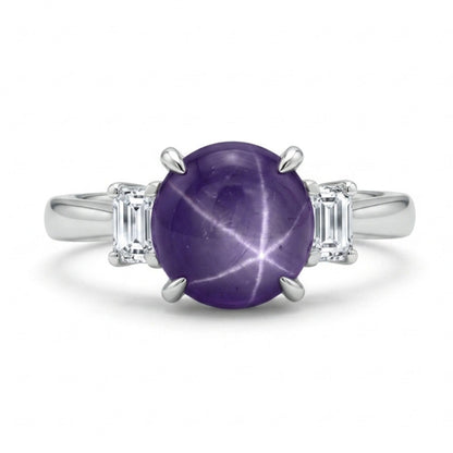Platinum 4.72ct Oval Star Sapphire 0.25cttw White Diamonds Ring