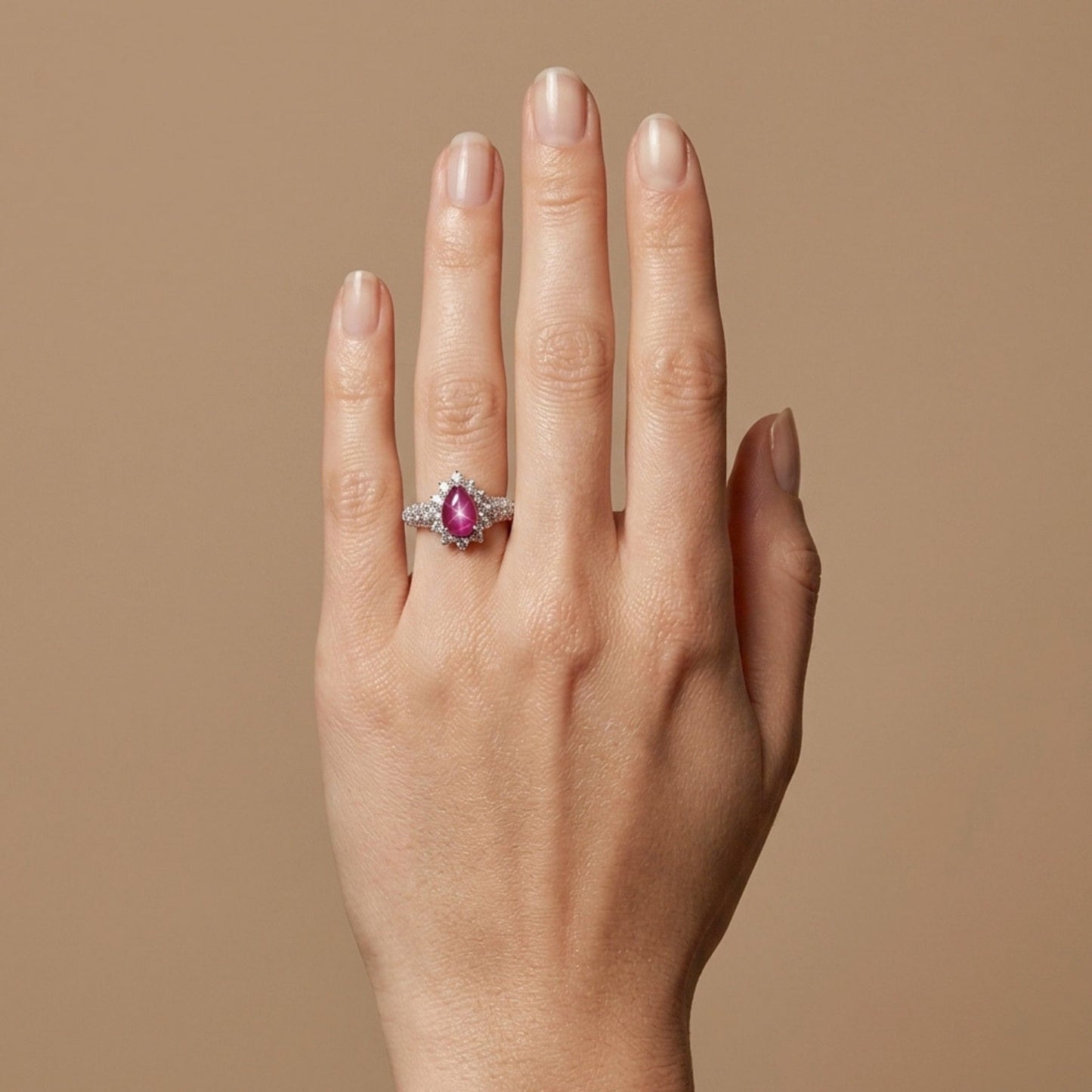 Platinum 1.29ct Pear Shape Star Ruby 1.00cttw White Diamonds Ring