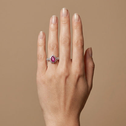 Platinum 1.29ct Pear Shape Star Ruby 1.00cttw White Diamonds Ring