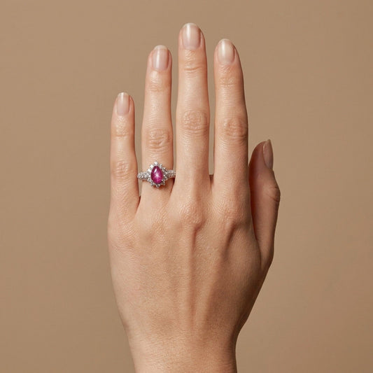 Platinum 1.29ct Pear Shape Star Ruby 1.00cttw White Diamonds Ring