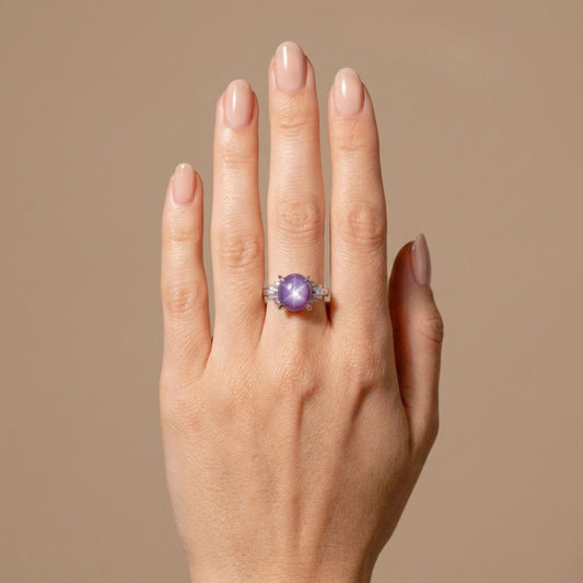 Platinum 6.87ct Oval Star Sapphire 0.20cttw White Diamonds Ring