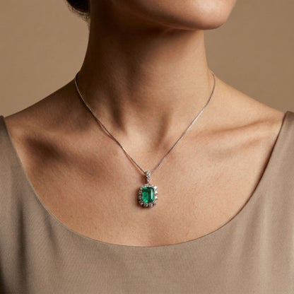 Platinum 1.83ct Emerald Cut Colombian Emerald 0.66cttw White Diamonds Necklace