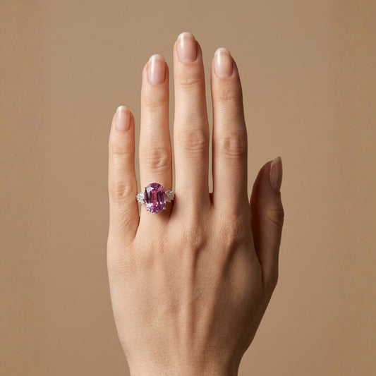 14K 10.99ct Oval Kunzite 0.46cttw White Diamonds Ring