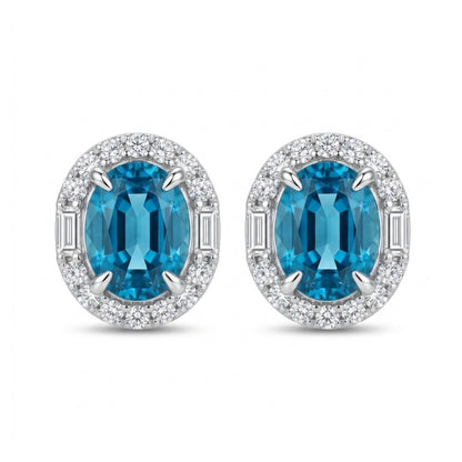18K 6.24cttw Oval Blue Zircon 0.53cttw White Diamonds Stud Earrings