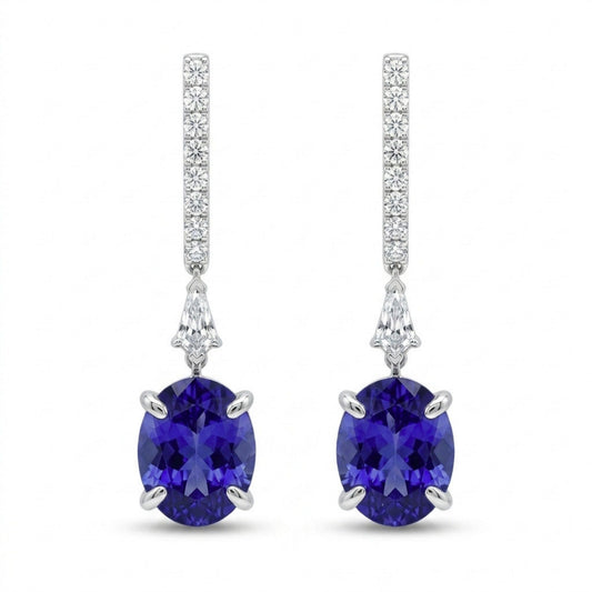 18K 6.40cttw Oval Blue Wing Tanzanite 0.47cttw White Diamonds Drop Earrings
