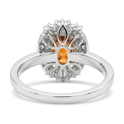 18K gold oval mandarin garnet ring with VS white diamonds