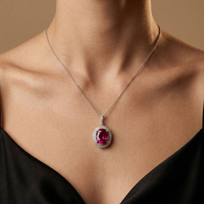 18K 3.91ct Oval Copper Bearing Tourmaline 0.61cttw White Diamonds Pendant