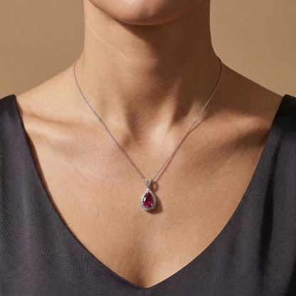 18K 1.72ct Pear Shape Copper Bearing Tourmaline 0.33cttw White Diamonds Pendant