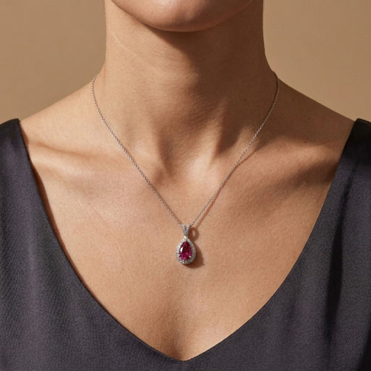 18K 1.72ct Pear Shape Copper Bearing Tourmaline 0.33cttw White Diamonds Pendant