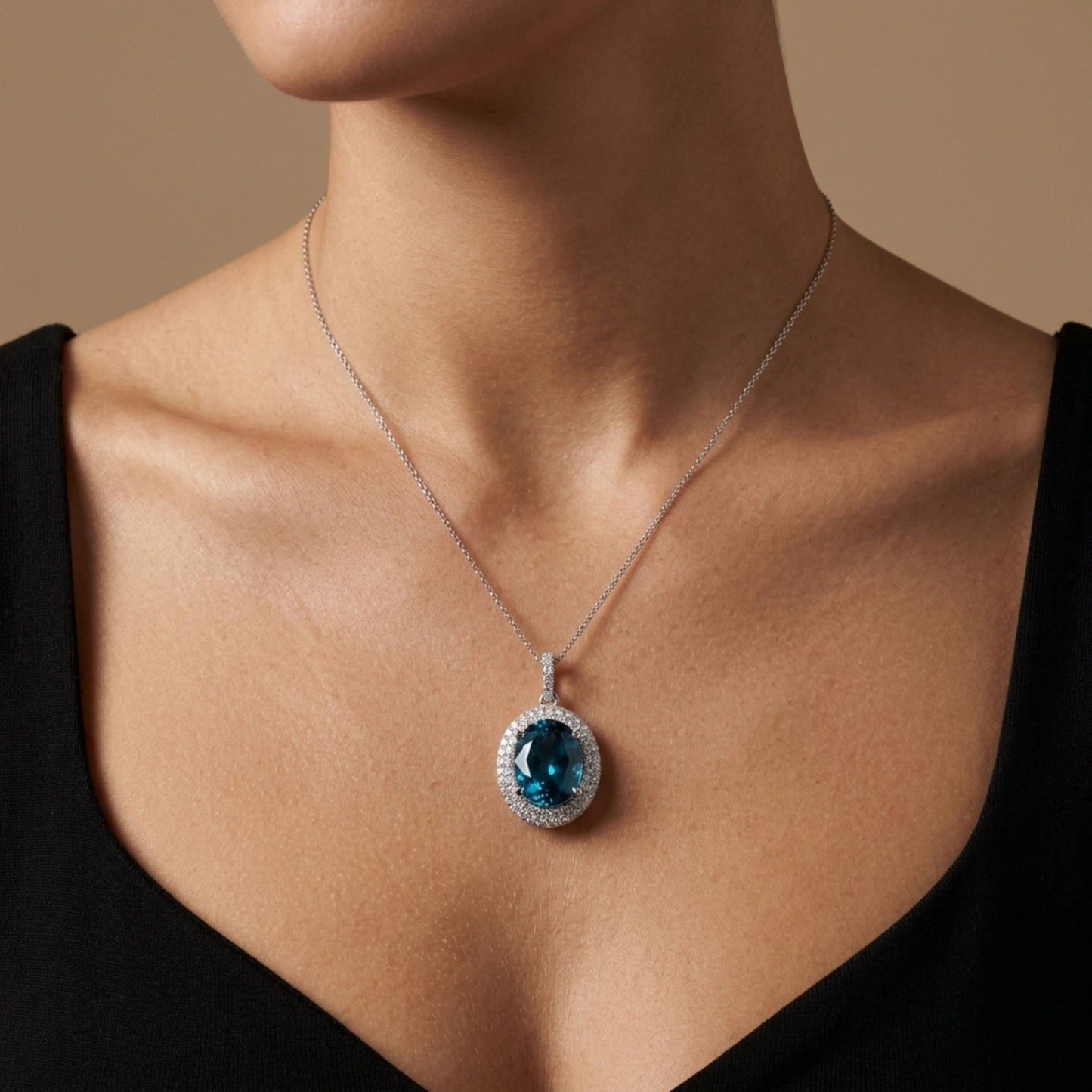 18K 7.80ct Oval Blue Zircon 0.61cttw White Diamonds Pendant