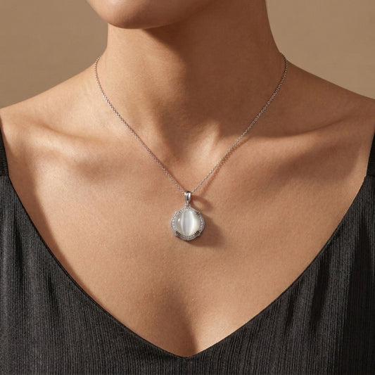 14K 4.90ct Round Cat's Eye Moonstone 0.13cttw VS White Diamonds Pendant