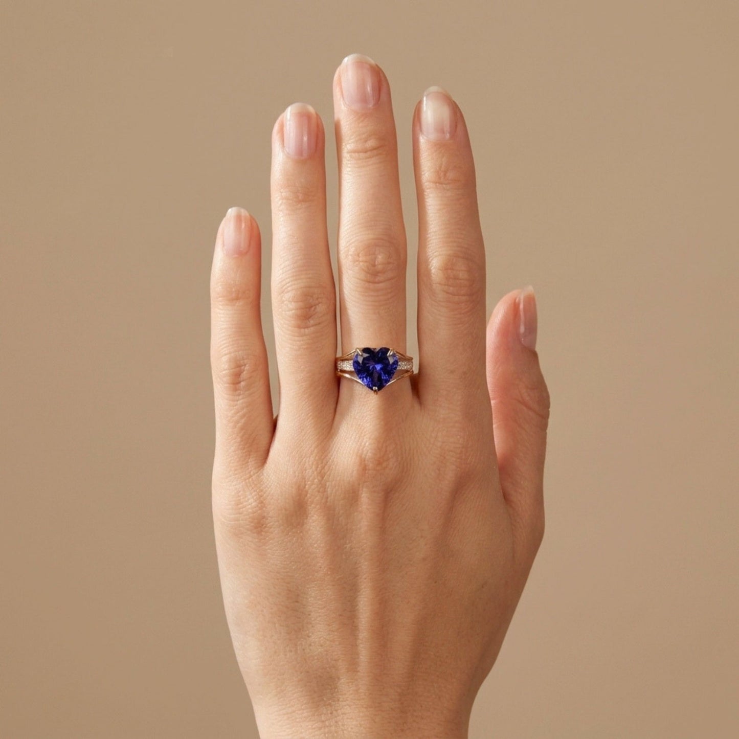 14K 5.33ct Heart Shape Blue Wing Tanzanite 0.21cttw VS White Diamonds Ring