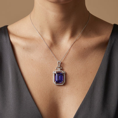 14K 7.10ct Emerald Cut Blue Wing Tanzanite 0.32cttw VS White Diamonds Pendant