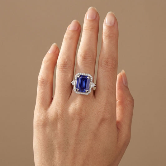14K 7.11ct Emerald Cut Blue Wing Tanzanite 0.55cttw VS White Diamonds Ring