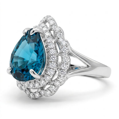 14K 4.06ct Pear Shape Blue Zircon 0.50cttw VS White Diamonds Ring