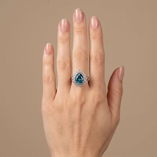 14K 4.06ct Pear Shape Blue Zircon 0.50cttw VS White Diamonds Ring