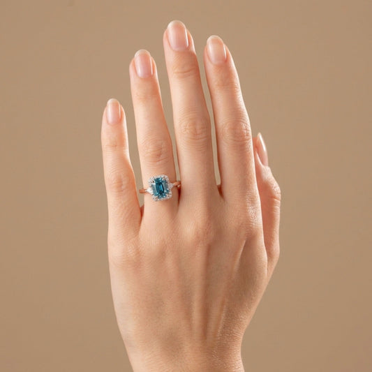 18K 2.80ct Oval Blue Zircon 0.34cttw White Diamonds Ring
