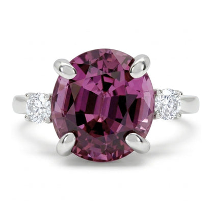 14K 3.87ct Oval Malaya Garnet 0.15cttw White Diamonds Ring