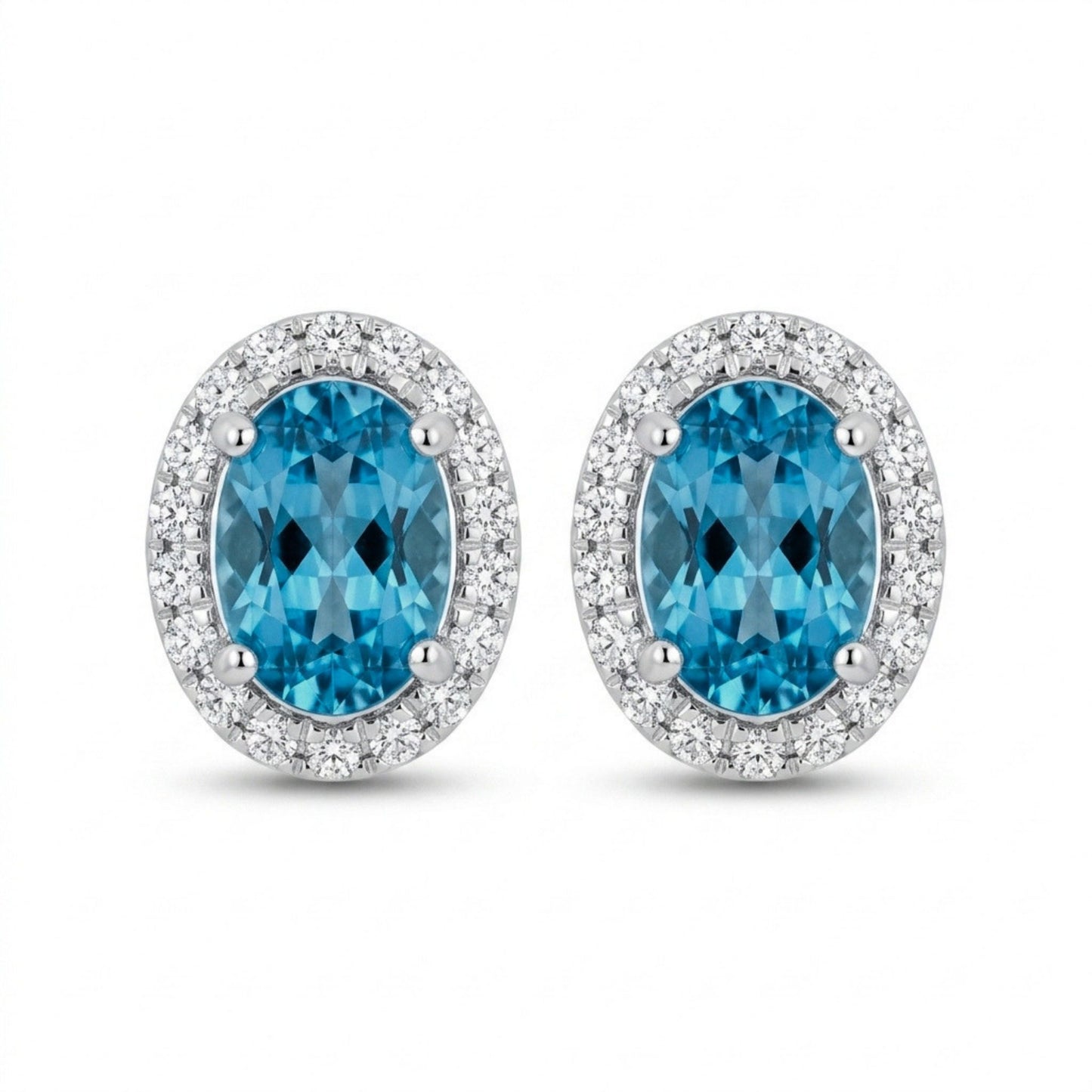 14K 1.68cttw Oval Blue Zircon 0.18cttw White Diamonds Stud Earrings
