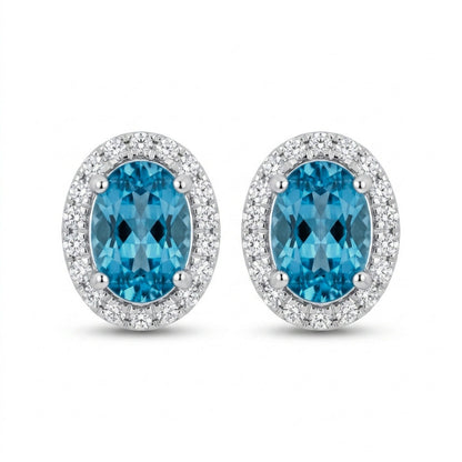 14K 1.68cttw Oval Blue Zircon 0.18cttw White Diamonds Stud Earrings