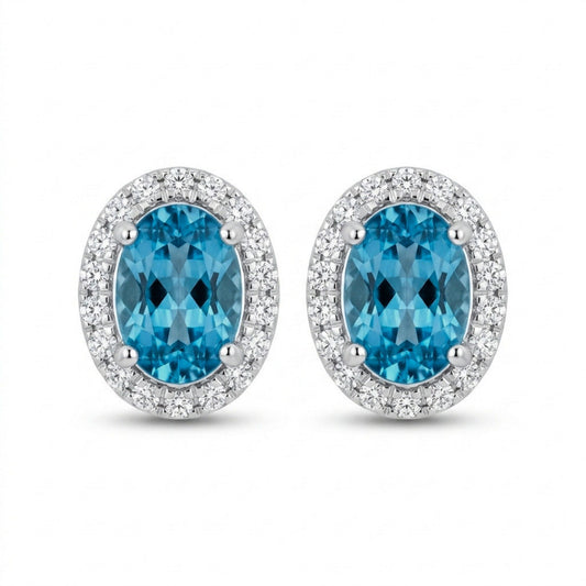 14K 1.68cttw Oval Blue Zircon 0.18cttw White Diamonds Stud Earrings