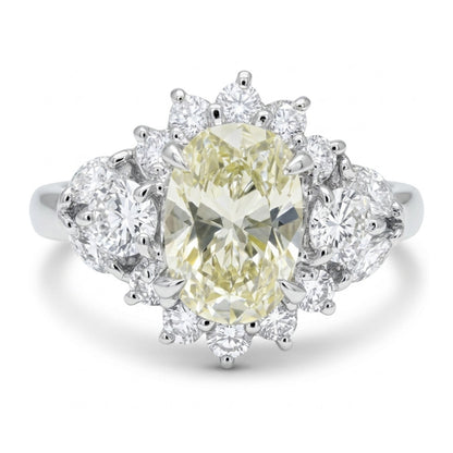 Platinum 1.05ct Oval Yellow Diamond 0.76cttw White Diamonds Ring