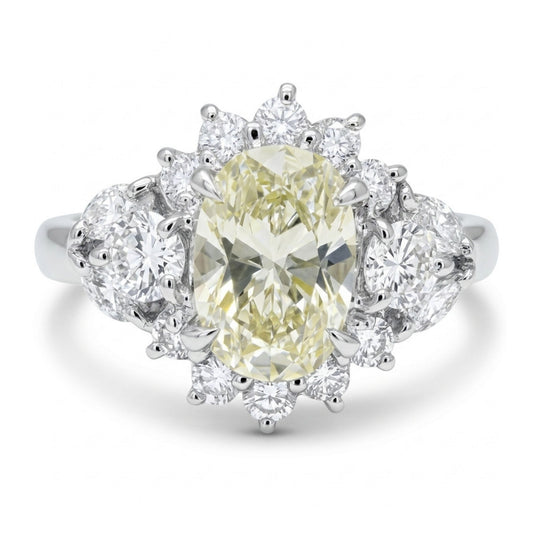 Platinum 1.05ct Oval Yellow Diamond 0.76cttw White Diamonds Ring