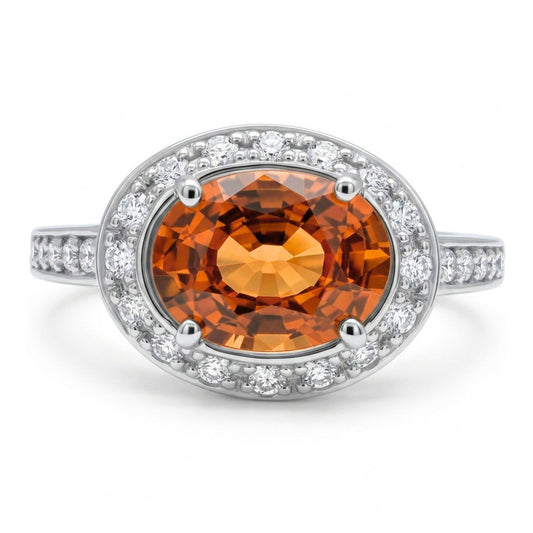 Platinum 1.81ct Oval Mandarin Garnet 0.23cttw White Diamonds Ring
