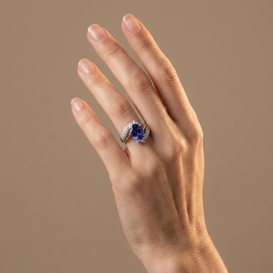 Platinum 3.32ct Oval Blue Wing Tanzanite 1.09cttw White Diamonds Ring