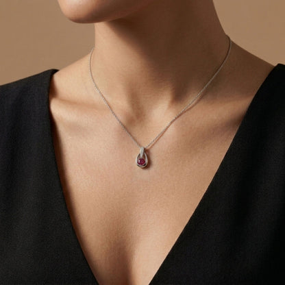 Platinum 0.56ct Oval Ruby 0.05cttw White Diamonds Necklace