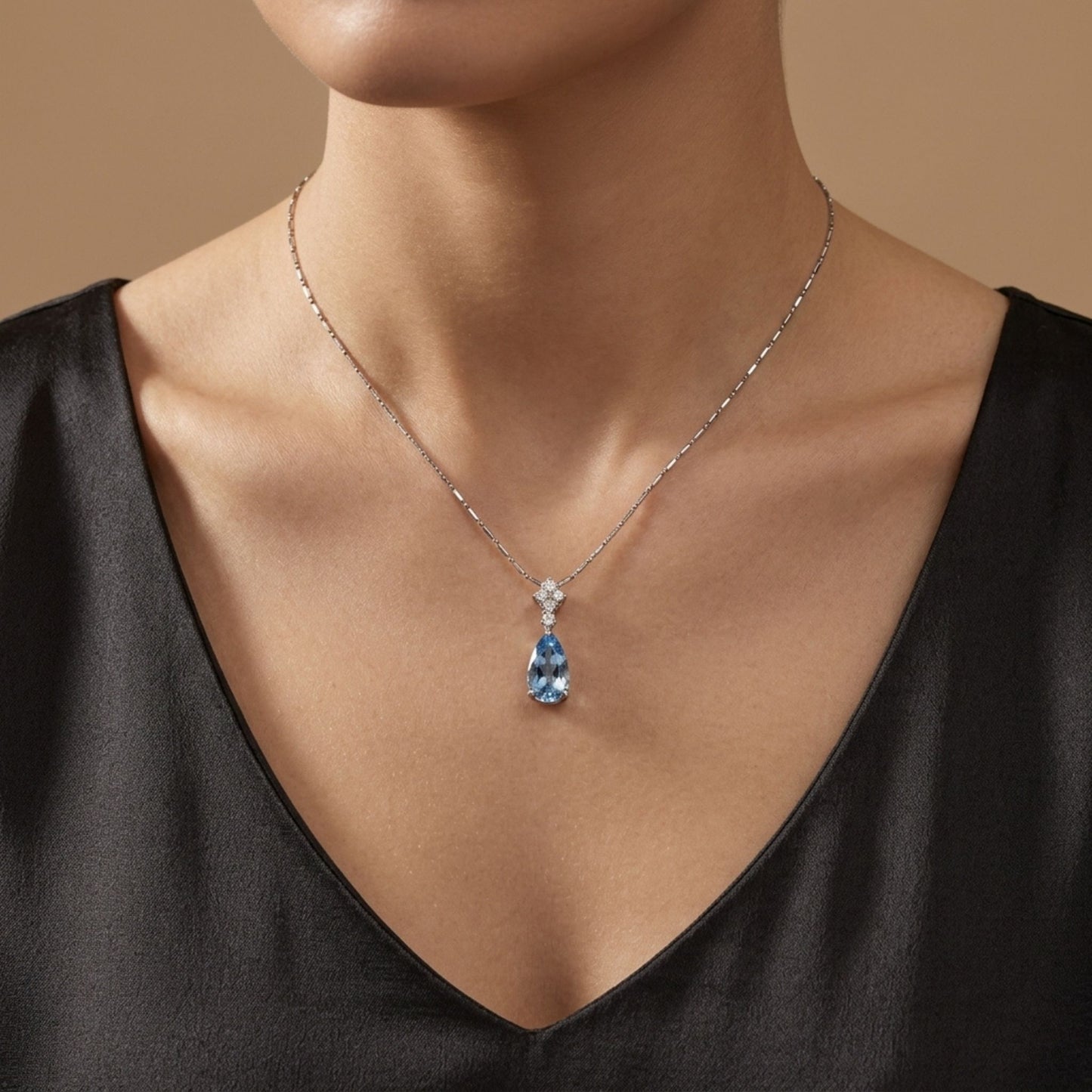 Platinum 1.37ct Pear Shape Santa Maria Aquamarine 0.11cttw White Diamonds Necklace