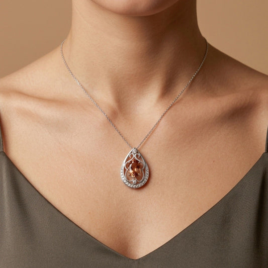 18K 2.66ct Oval Imperial Topaz 0.14cttw White Diamonds Pendant